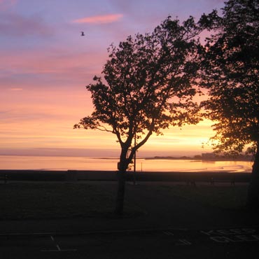 Sunrise from the bedroom of Pebbles cottage